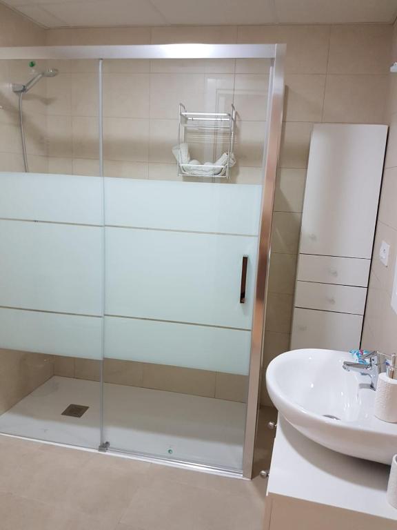 Kúpeľňa v ubytovaní Apartamentos HELA