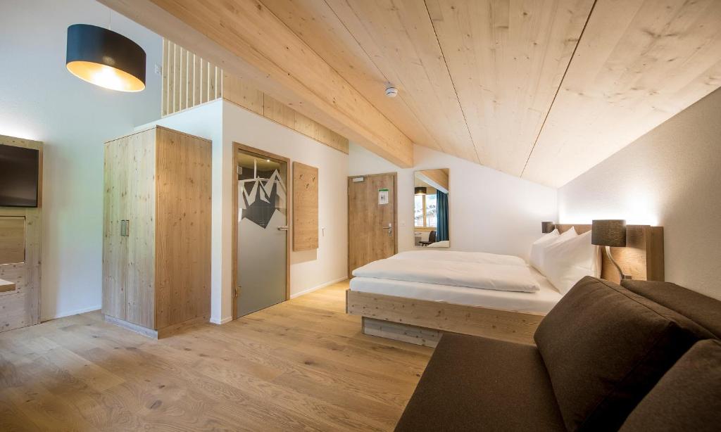 Gadmer Lodge - dein Zuhause in den Bergen客房内的一张或多张床位