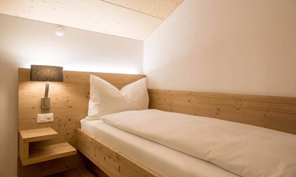 Gadmer Lodge - dein Zuhause in den Bergen客房内的一张或多张床位