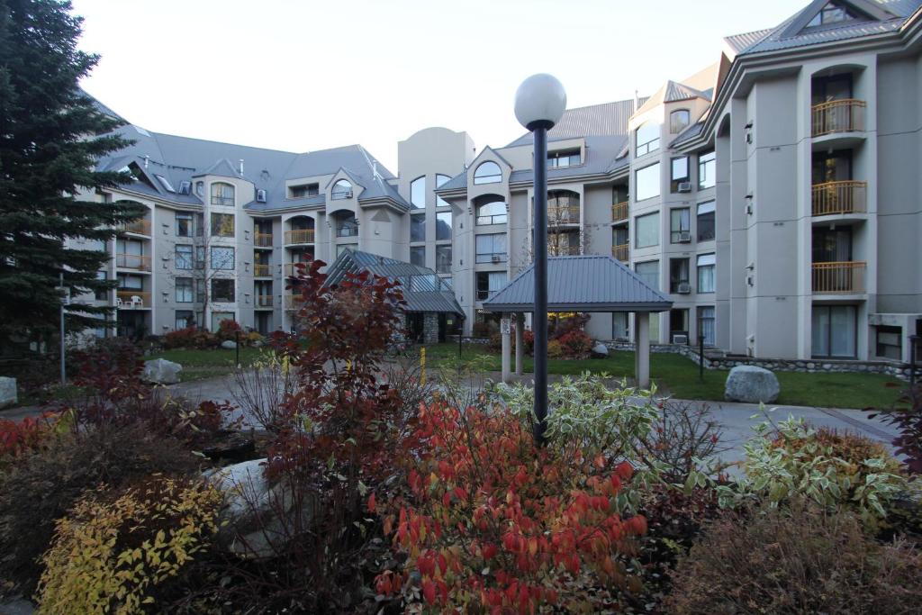 a group of apartment buildings with a garden at Marquise Condos by Whistler Retreats in Whistler