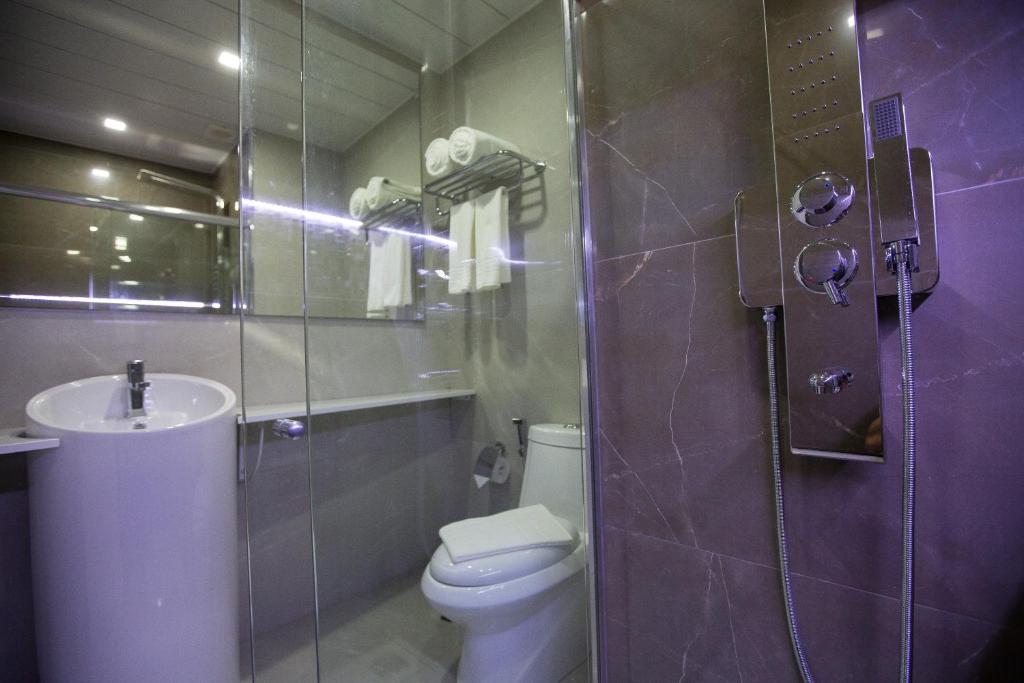 Koupelna v ubytování Bello Hotel