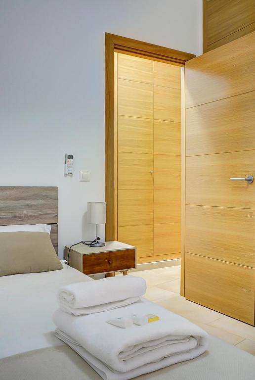 A bed or beds in a room at Apartamento San Julian
