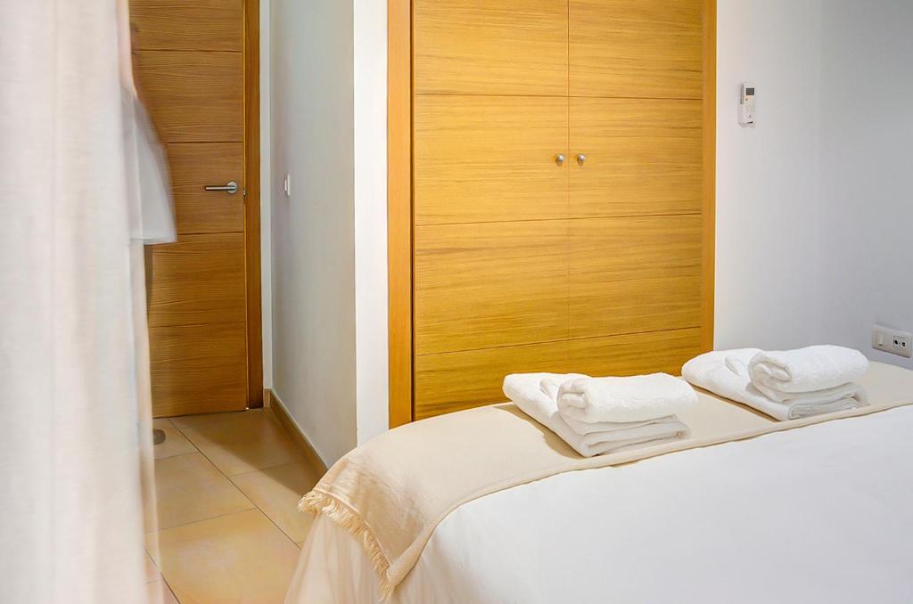 A bed or beds in a room at Apartamento San Julian