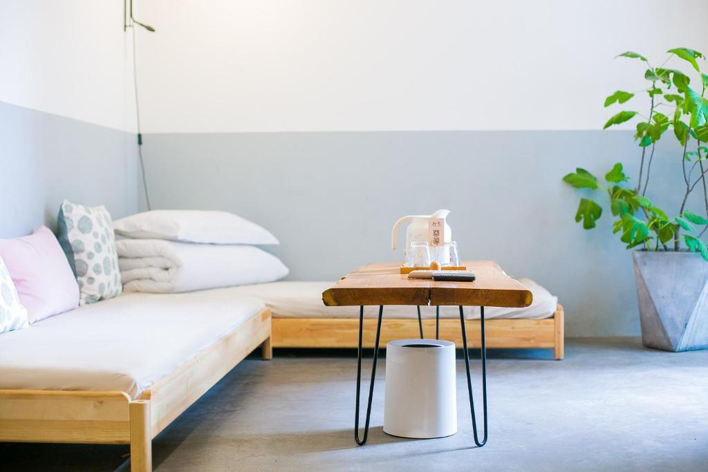 Postel nebo postele na pokoji v ubytování HOME++ Xi'an