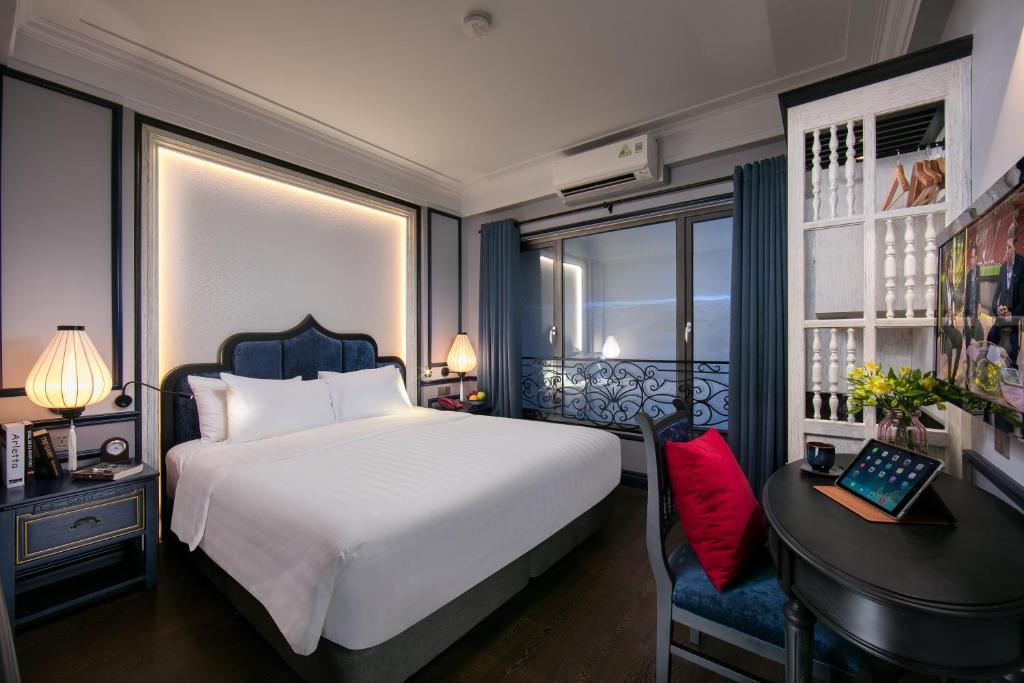 Postel nebo postele na pokoji v ubytování La Beaute Boutique Hotel & Spa
