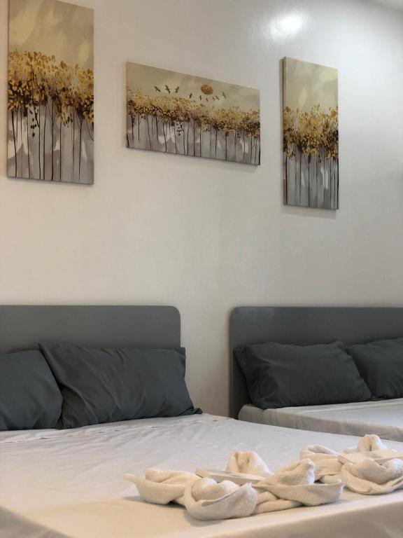 Postel nebo postele na pokoji v ubytování Bulusan Tourist Inn