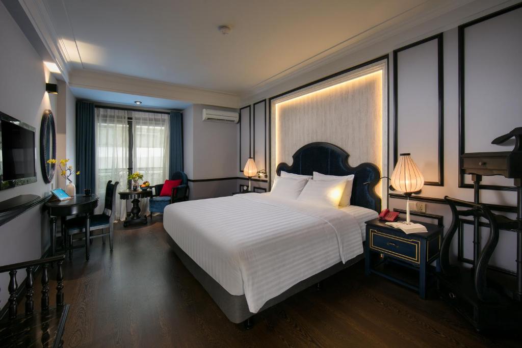 Postel nebo postele na pokoji v ubytování La Beaute Boutique Hotel & Spa
