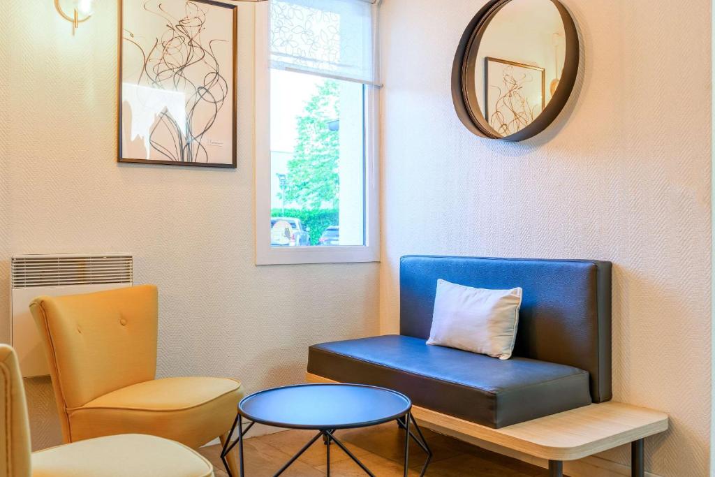 Posezení v ubytování Comfort Hotel Amiens Nord