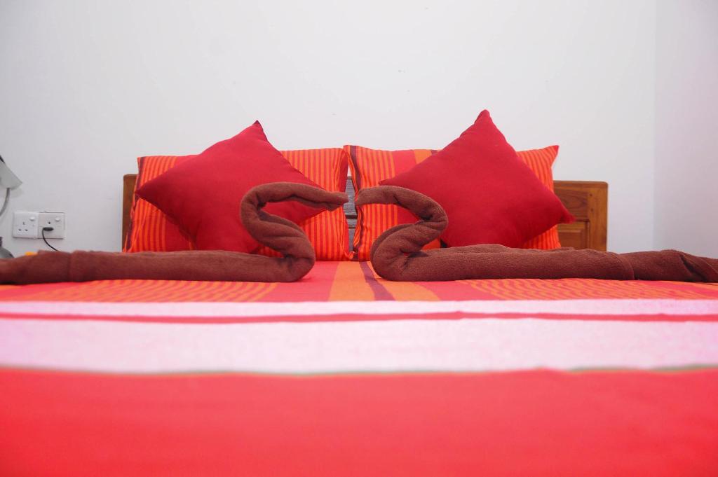 Postel nebo postele na pokoji v ubytování Restwell Homestay