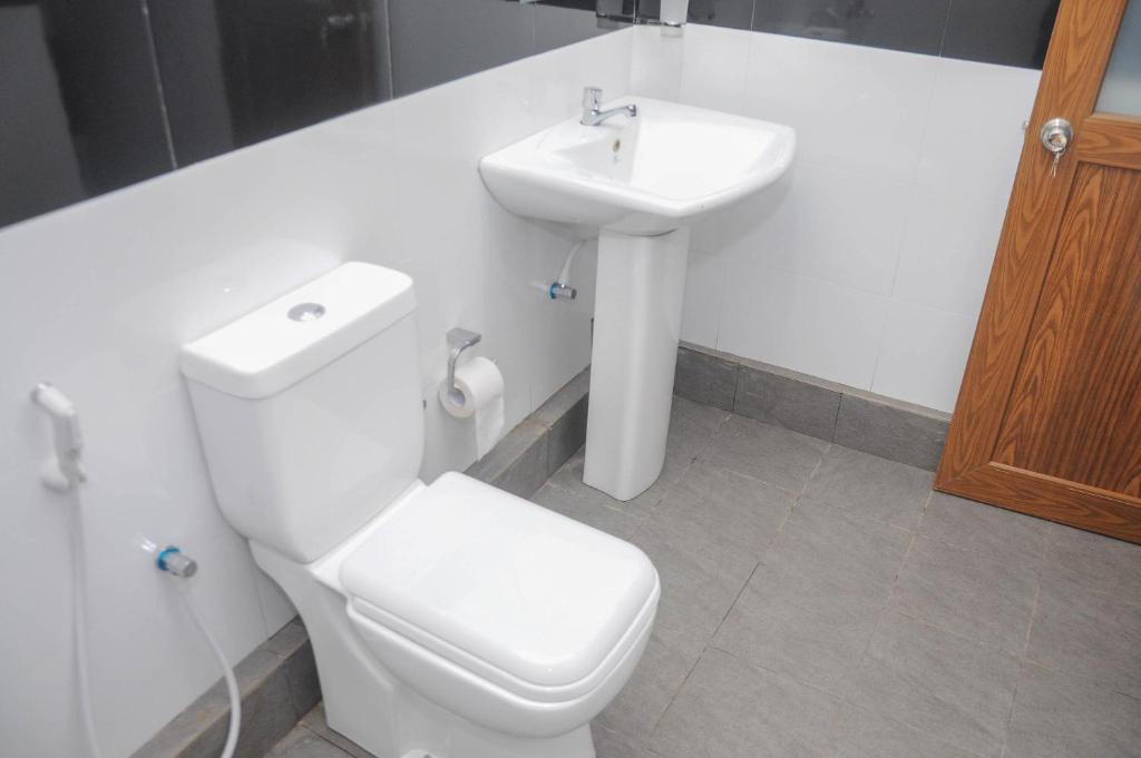 Koupelna v ubytování Restwell Homestay
