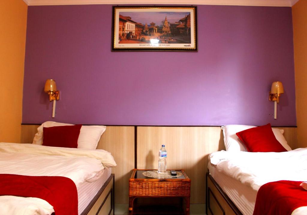 Postel nebo postele na pokoji v ubytování Hotel Tranquil