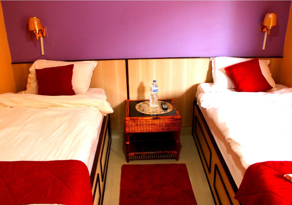 Postel nebo postele na pokoji v ubytování Hotel Tranquil