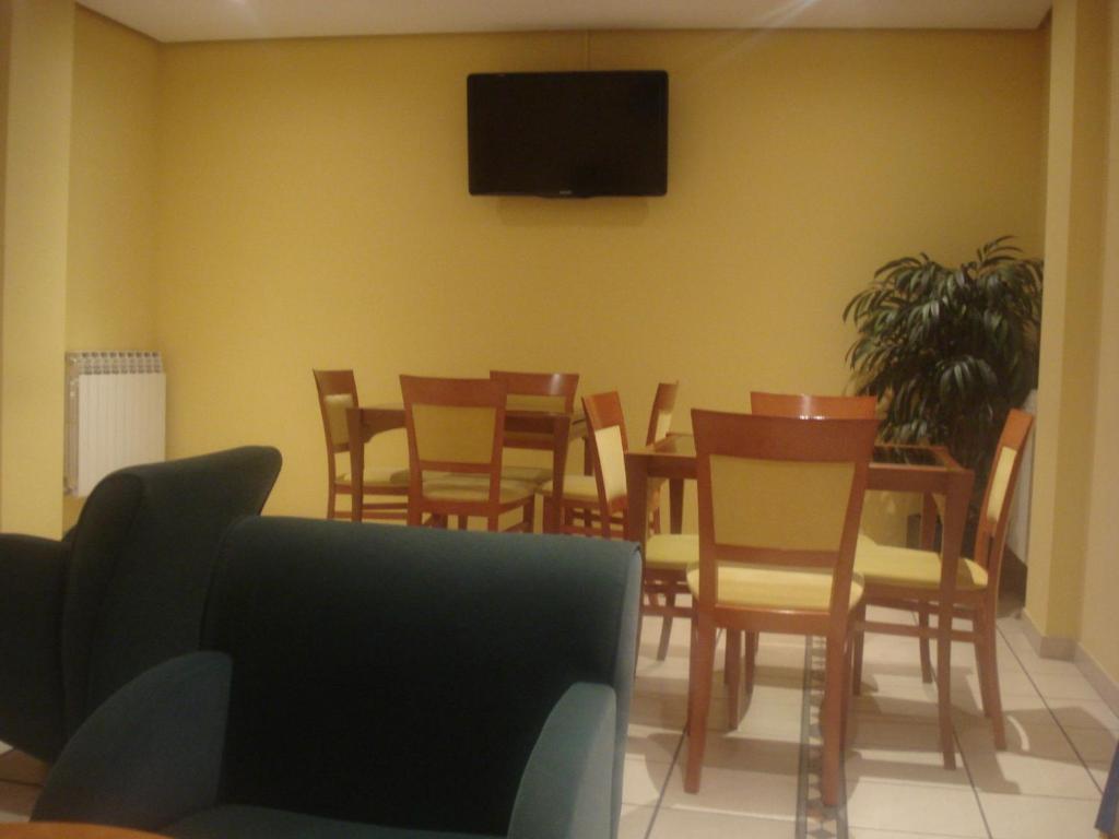 TV a/nebo společenská místnost v ubytování Hotel Isabel