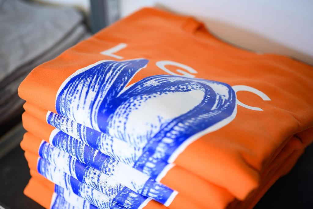 Postel nebo postele na pokoji v ubytování Hotel La Grande Cloche