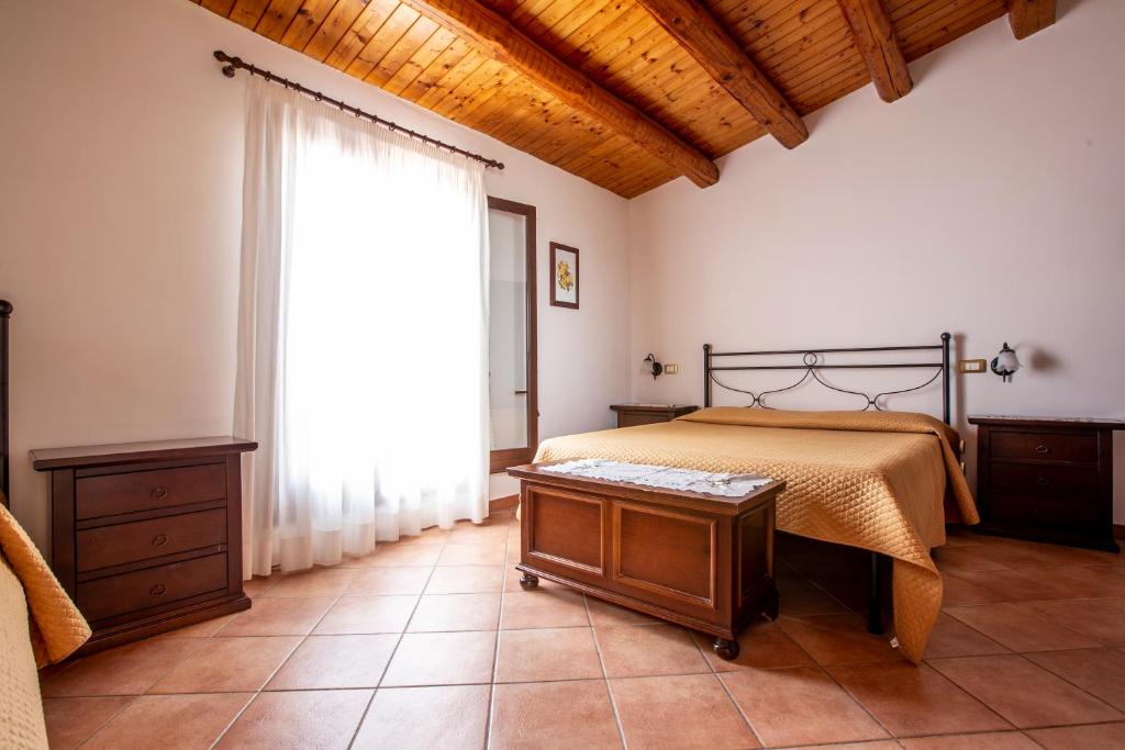 Postel nebo postele na pokoji v ubytování La Vignazza B&B