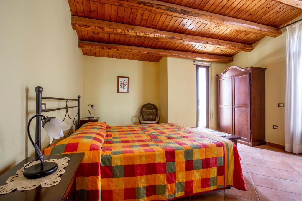 Postel nebo postele na pokoji v ubytování La Vignazza B&B
