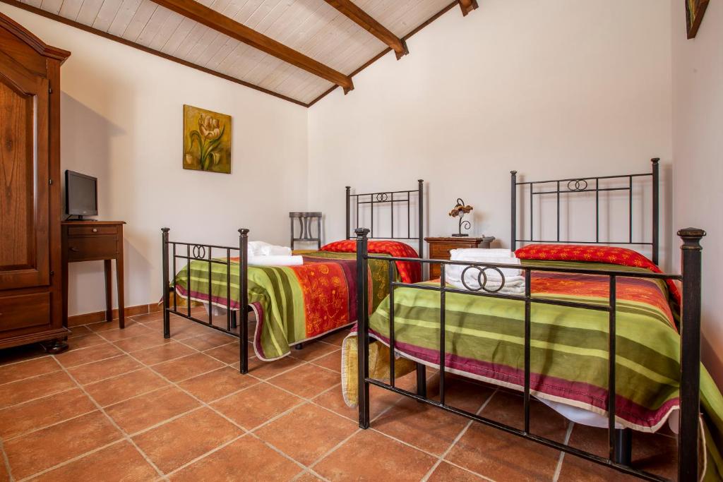 Postel nebo postele na pokoji v ubytování La Vignazza B&B