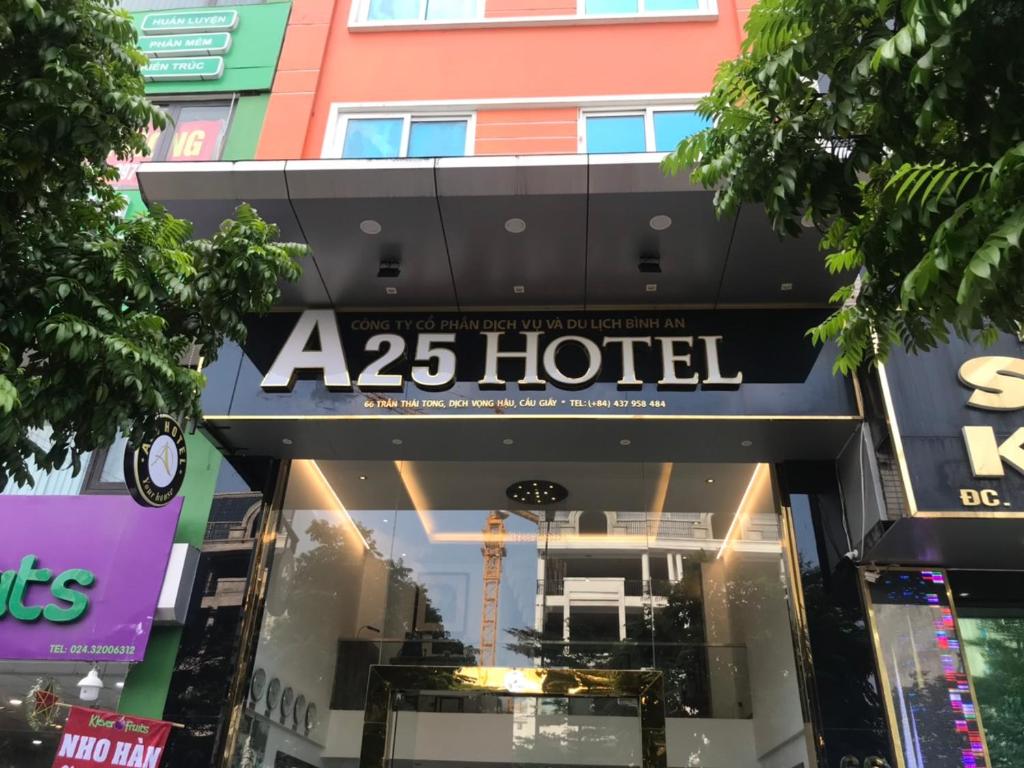 aza hotel sign on the front of a building at A25 Hotel - 66 Trần Thái Tông in Hanoi