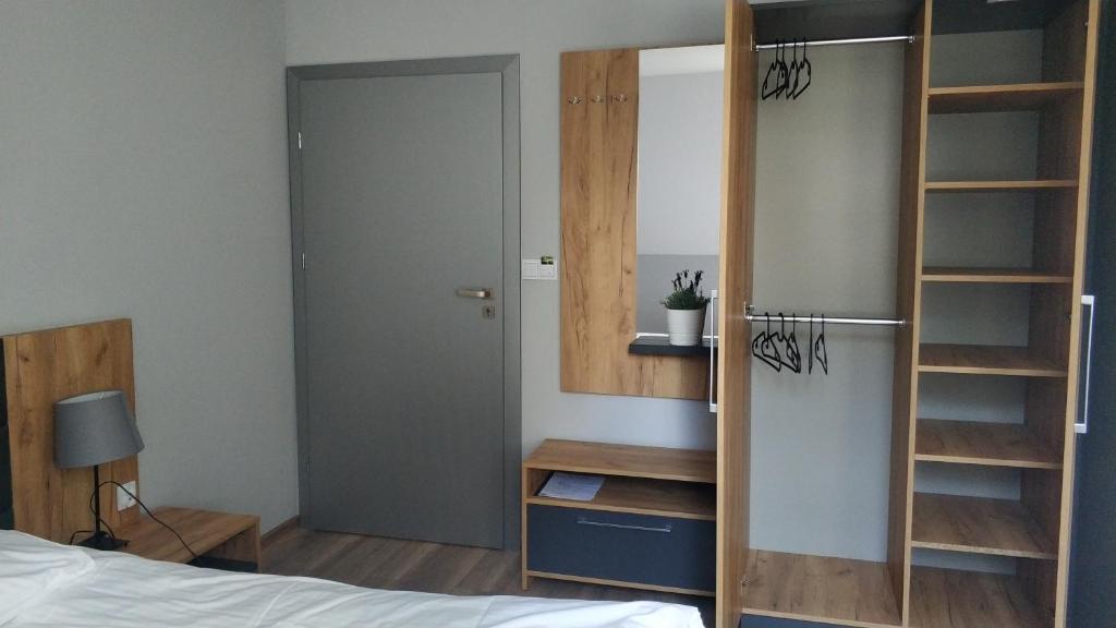 Postel nebo postele na pokoji v ubytování Jurajska Przystań
