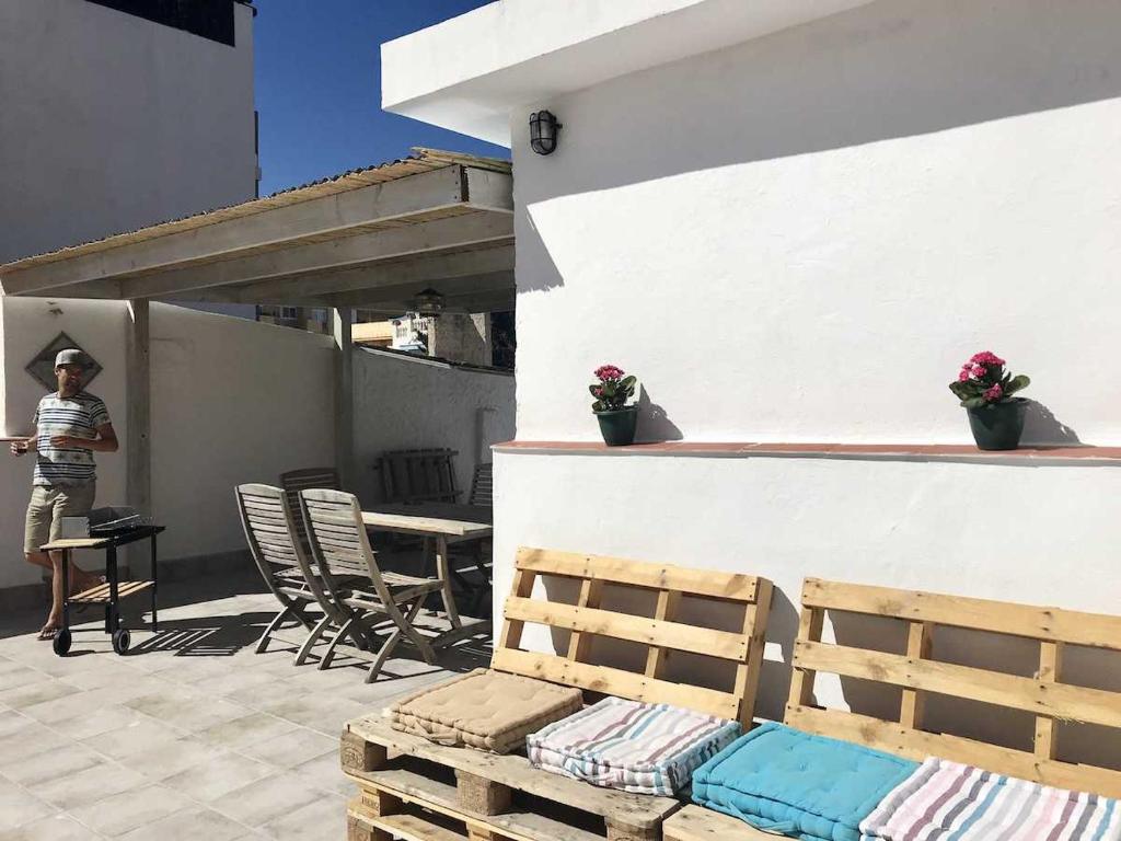 Balkón nebo terasa v ubytování Malaga Beach House, 2 city bikes, 2 children's bikes, WiFi, BIG terrace, BBQ, Family, Childfriendly