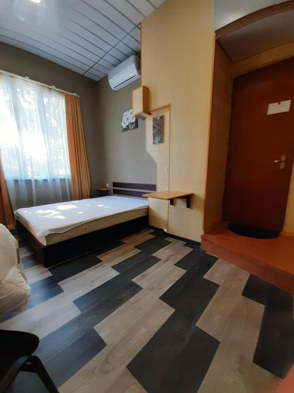 Postel nebo postele na pokoji v ubytování Joniskera
