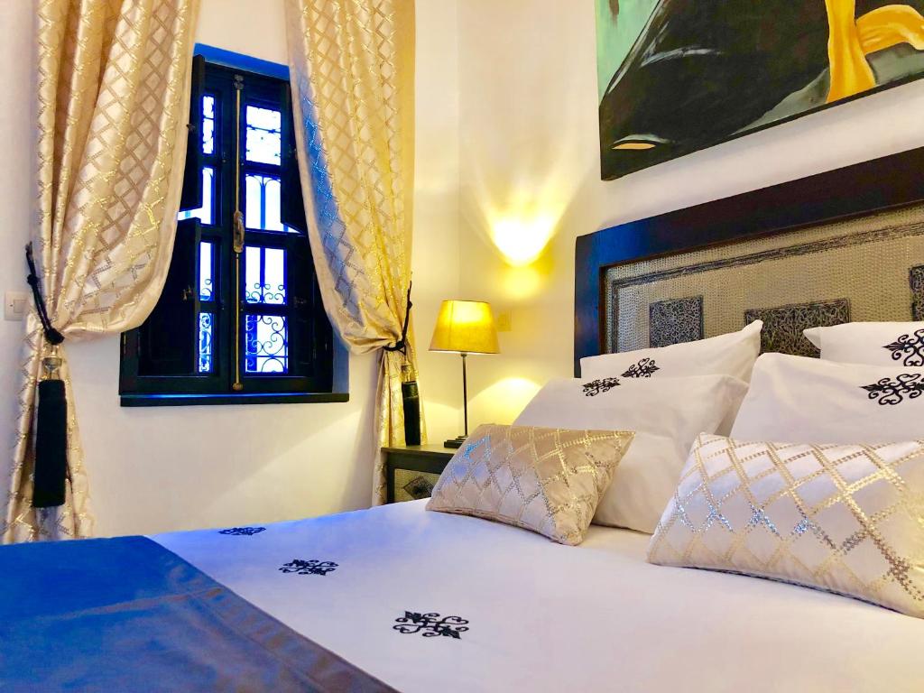 Postel nebo postele na pokoji v ubytování Maison Chafia Boutique Hôtel & Spa