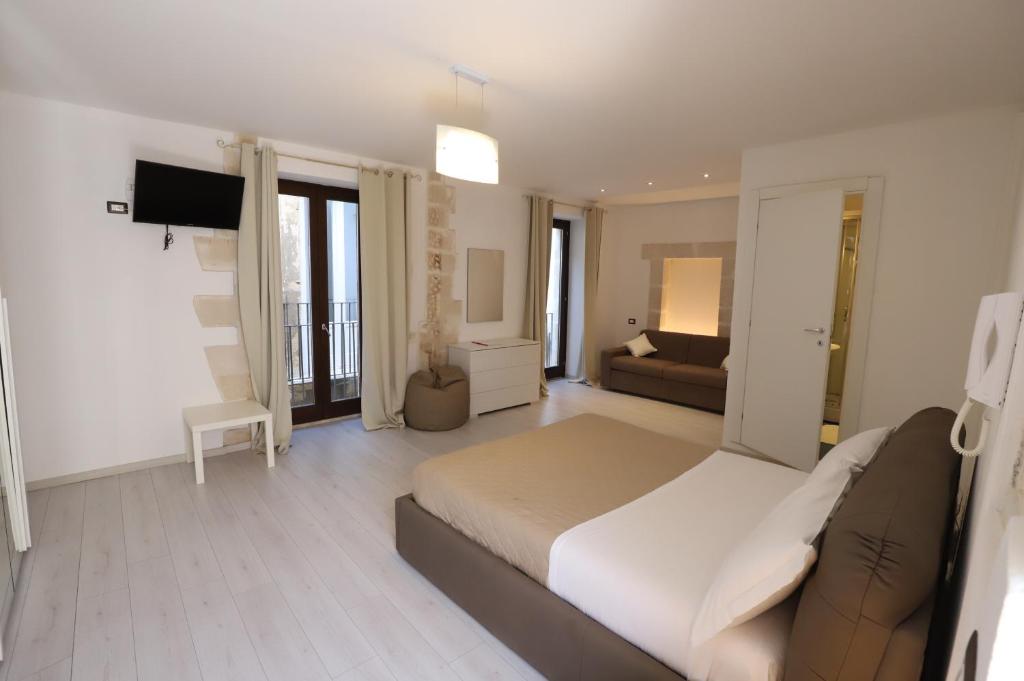 Postel nebo postele na pokoji v ubytování Italiana Resort Atrio