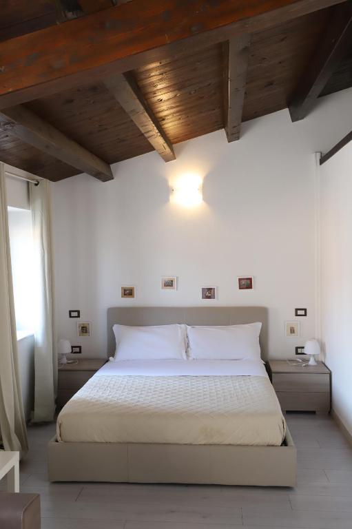 Postel nebo postele na pokoji v ubytování Italiana Resort Atrio