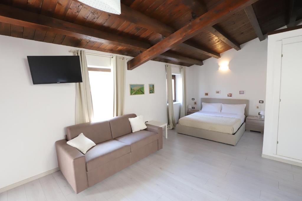 Postel nebo postele na pokoji v ubytování Italiana Resort Atrio