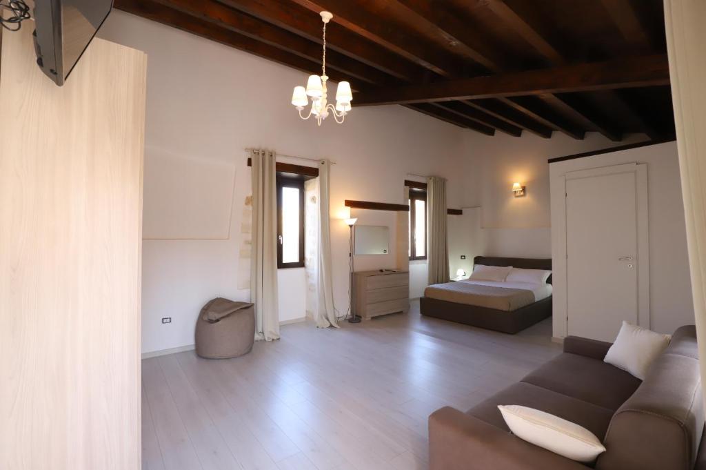 Postel nebo postele na pokoji v ubytování Italiana Resort Atrio