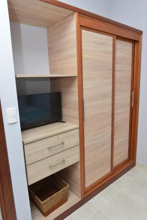 TV a/nebo společenská místnost v ubytování SWEET DREAM