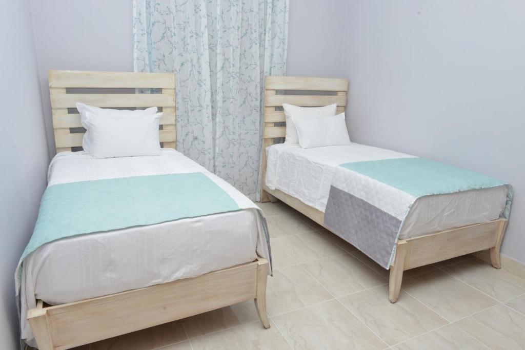 Postel nebo postele na pokoji v ubytování SWEET DREAM