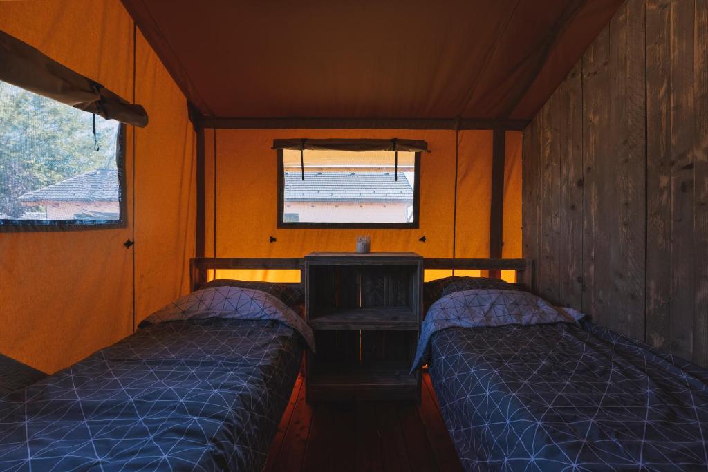 Posteľ alebo postele v izbe v ubytovaní Szálka Glamping