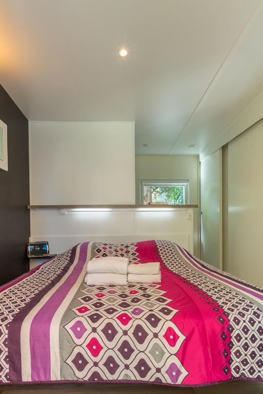 Postel nebo postele na pokoji v ubytování Camping Le Méditerranée Argelès - Domaine piétonnier