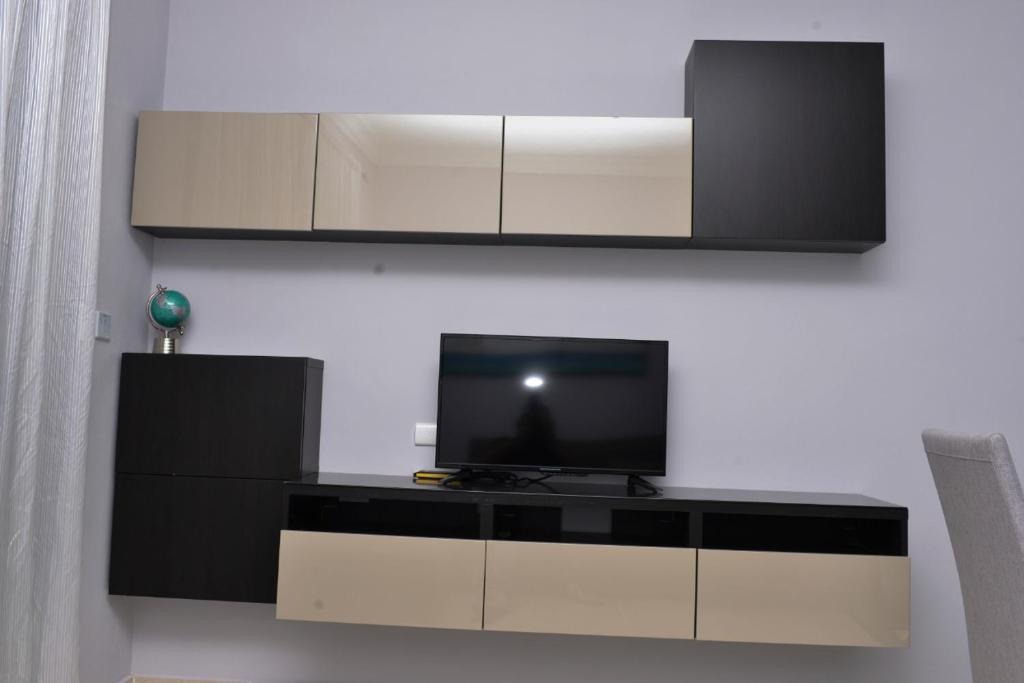 TV a/nebo společenská místnost v ubytování SWEET DREAM