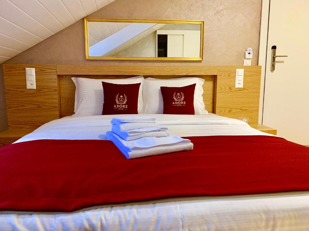 Postel nebo postele na pokoji v ubytování Hotel Adore
