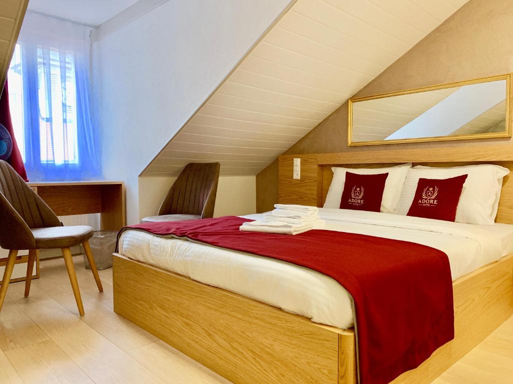 Postel nebo postele na pokoji v ubytování Hotel Adore