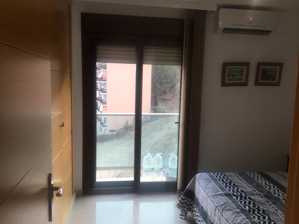 Posteľ alebo postele v izbe v ubytovaní Apartamento Carvajal Fuengirola