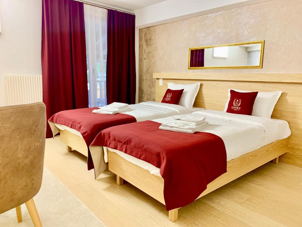 Postel nebo postele na pokoji v ubytování Hotel Adore