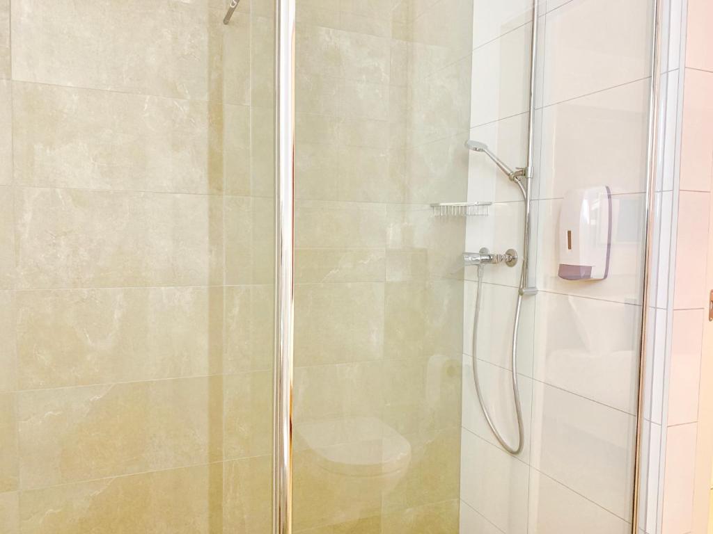 Koupelna v ubytování Hotel Adore