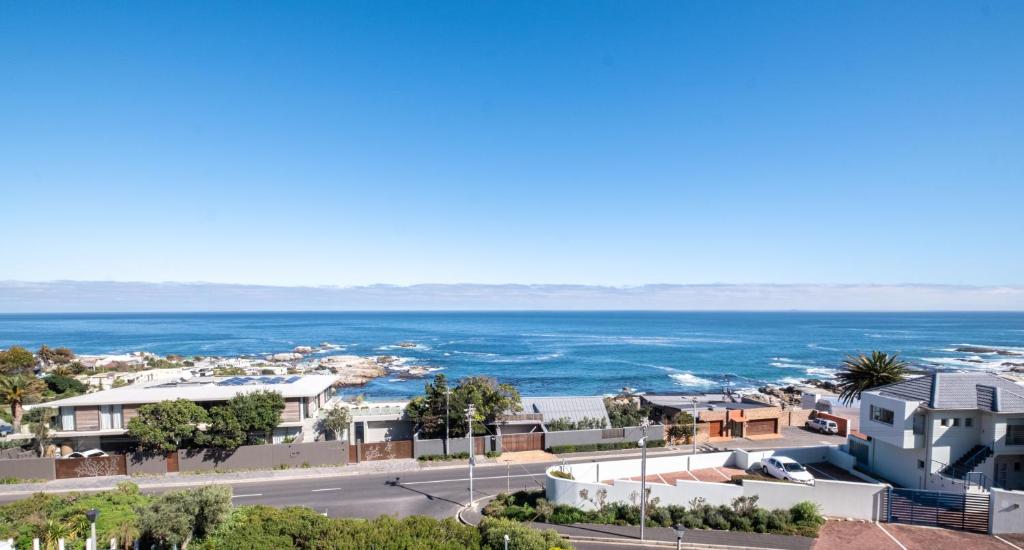 a view of the ocean from a house at 3 On Camps Bay in Cape Town