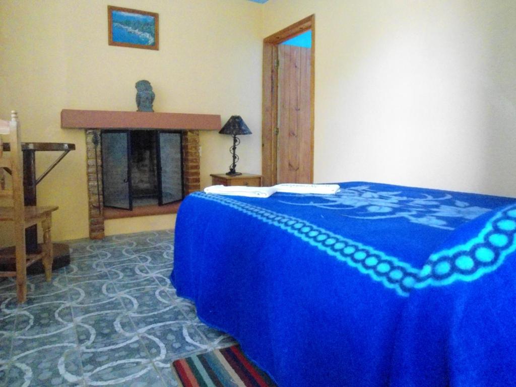 Postel nebo postele na pokoji v ubytování Posada Dos Hermanos