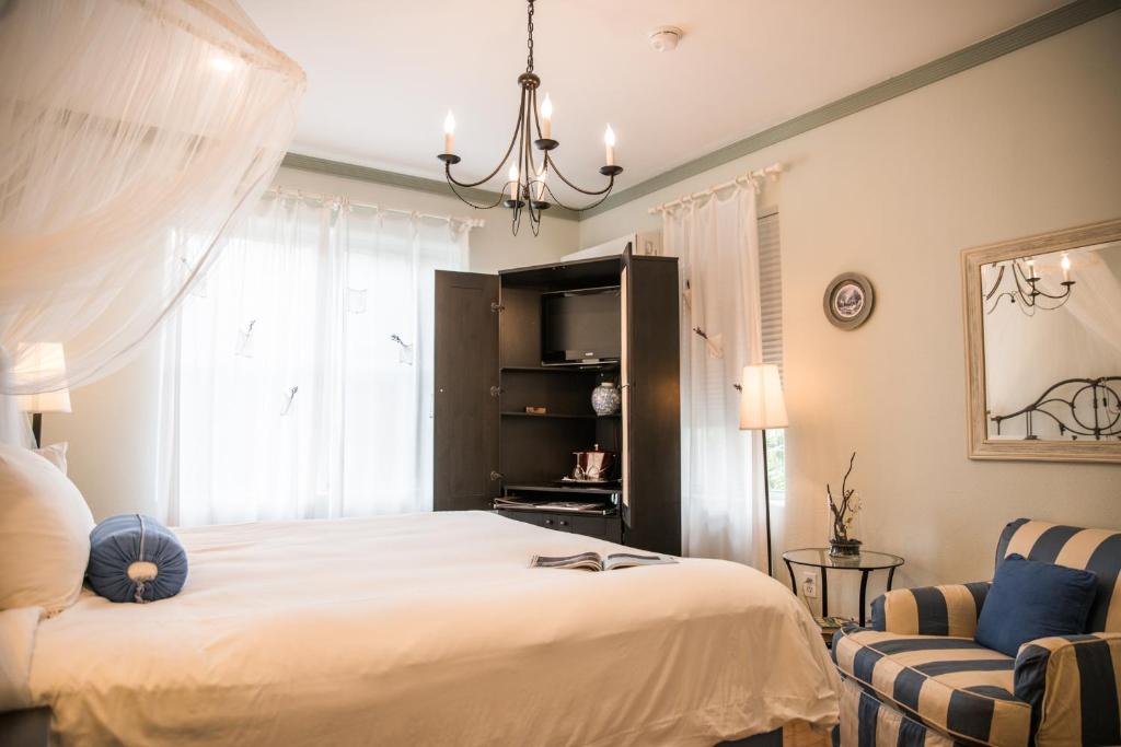 Voodi või voodid majutusasutuse Cadet Hotel toas