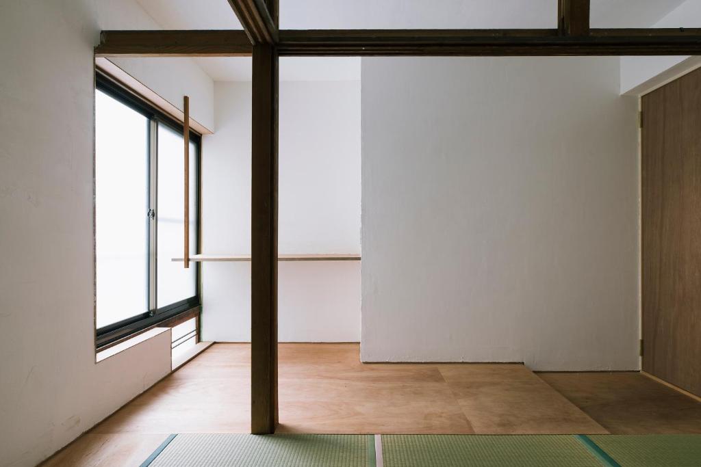 Fotografie z fotogalerie ubytování Atelier & Hostel Nagaisa-Ura v destinaci Atami