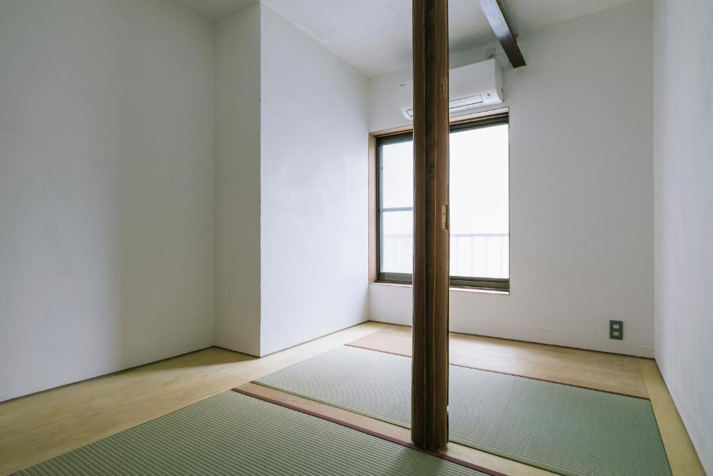 Fotografie z fotogalerie ubytování Atelier & Hostel Nagaisa-Ura v destinaci Atami