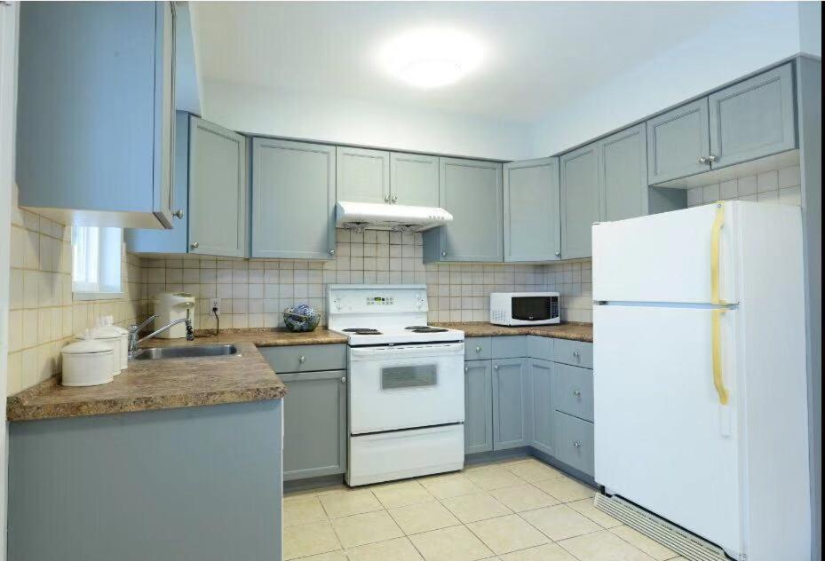 Kuchyň nebo kuchyňský kout v ubytování Brentwood Home