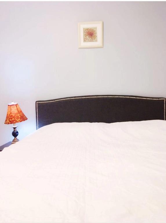 Postel nebo postele na pokoji v ubytování Brentwood Home
