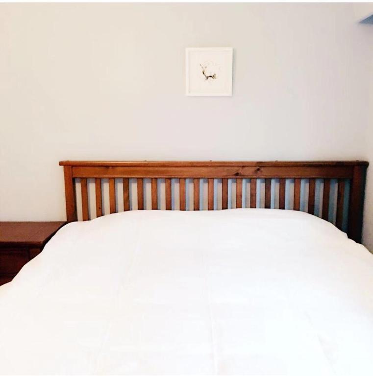 Postel nebo postele na pokoji v ubytování Brentwood Home