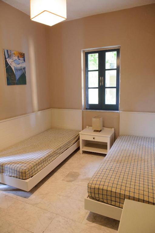 Postel nebo postele na pokoji v ubytování Kalydna Island Hotel