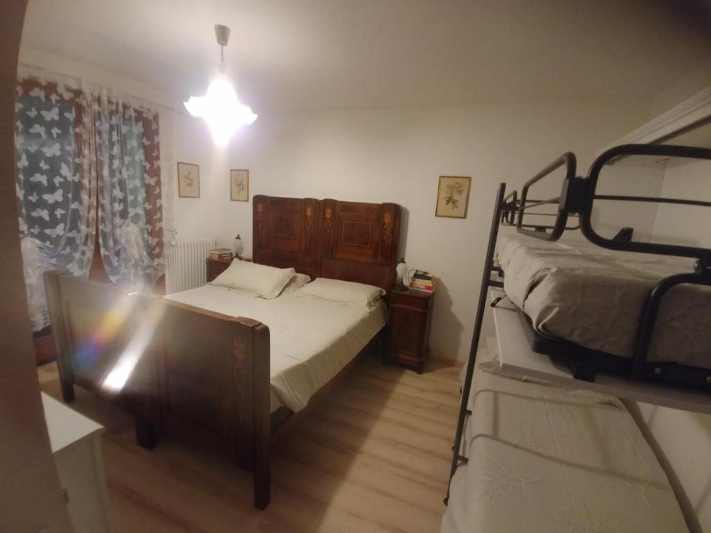 Postel nebo postele na pokoji v ubytování Balcone dei Limoni